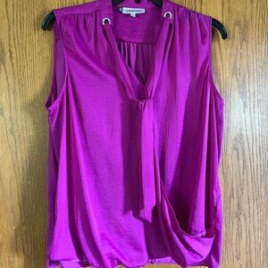 Beautiful Jennifer Lopez size XL blouse. Magenta in color.